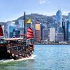 Cityscape Hong Kong and Junkboat at sunny day